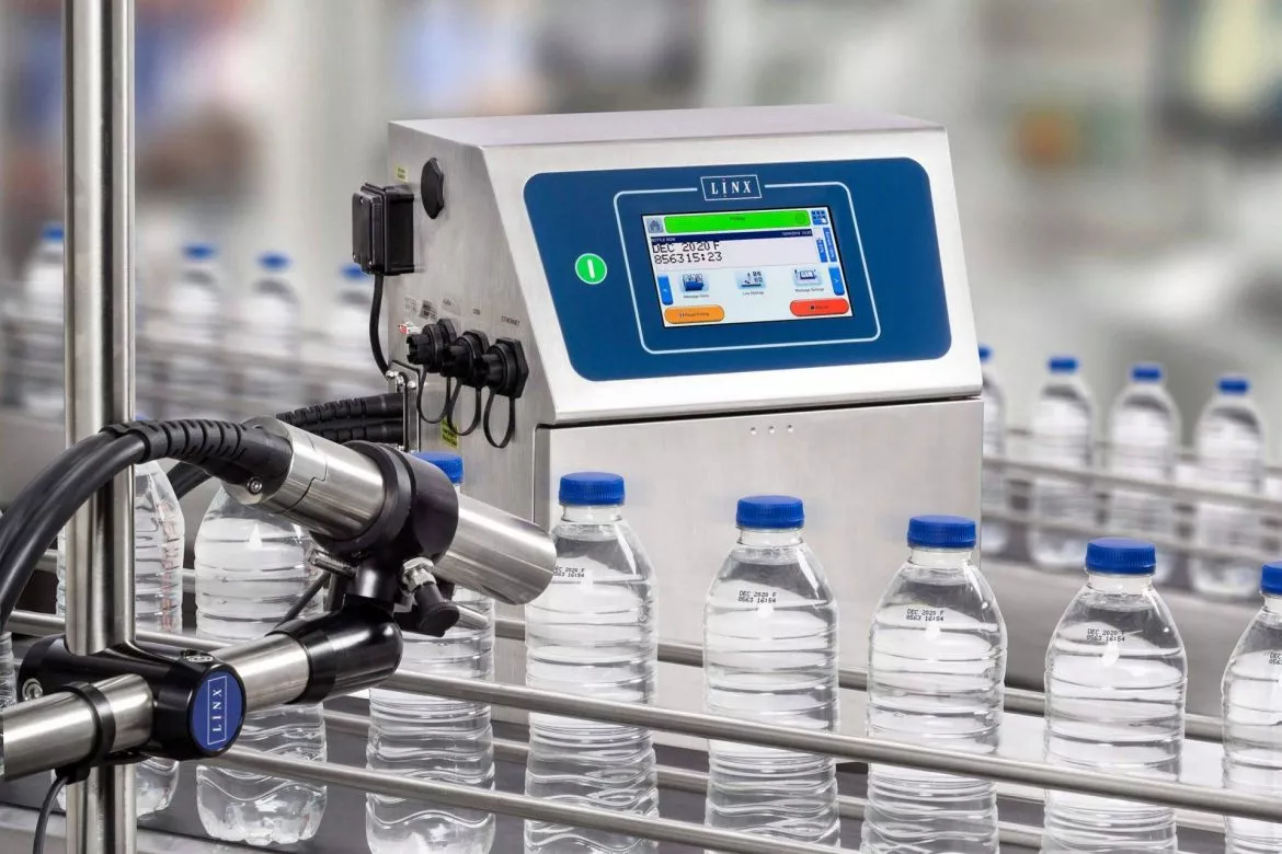 Packaging and filling machinery on a production line — context for marking, coding, and traceability